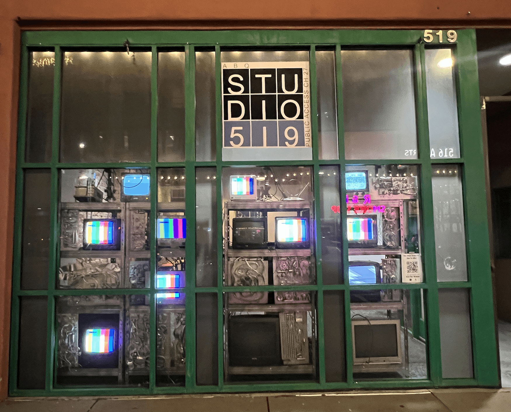 Tower of Cower II installation view with stacked illuminated screens